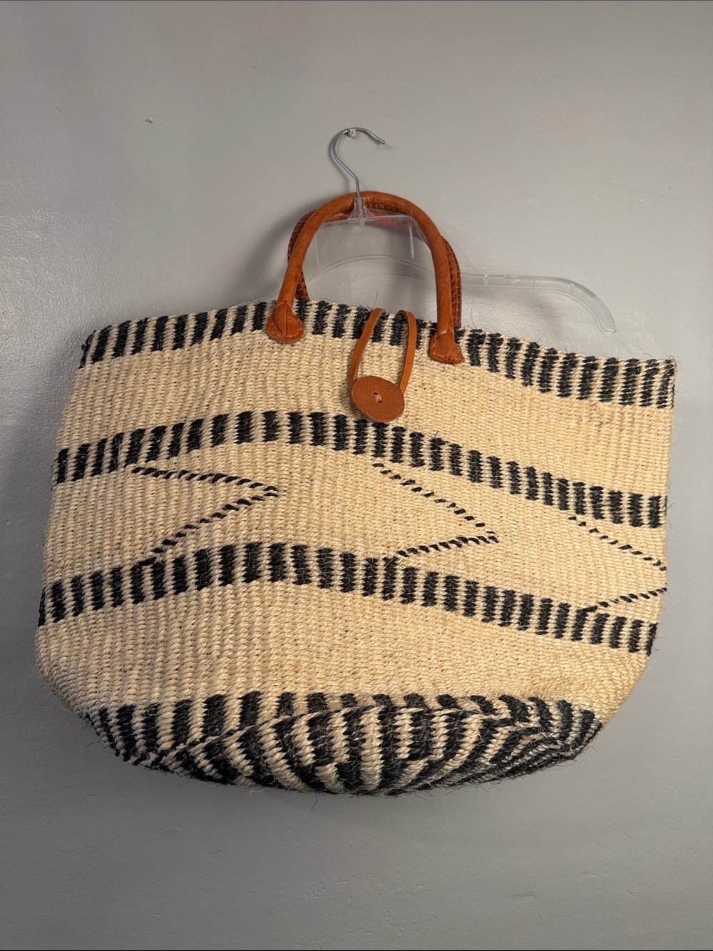 Adulatory Woven Straw Tote Bag with Black Stripe Pattern and Leather Handles